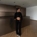 Women's black two-piece knit set featuring a cropped button top and high-waisted pants - S / Black