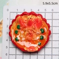 Detailed top view of 5.9x5.5cm resin lobster food magnet with broccoli detail - Butterfly Lobster