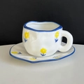 Irregular handmade ceramic coffee cup and saucer with blue lines and yellow floral pattern - Small Yellow Flower Cup & Saucer
