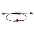 Detail of adjustable black woven rope bracelet featuring natural tiger eye stone and metal beads - Single Tiger Eye Braided