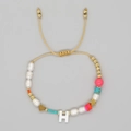 Adjustable beaded pearl bracelet with letter H charm and gold heart accents - Letter H Style (ZZ-B24061901H-F)