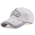 Fashionable white baseball cap featuring rhinestone crown and decorative brim - White