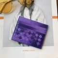 Slim purple woven sheepskin card holder wallet displayed on a fashion magazine background - Two-tone Purple