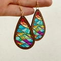 Detailed view of teardrop wood earrings with colorful stained glass acrylic inserts - Colored Geometric Window