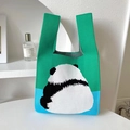 Detail of green and blue knitted tote bag with a cute panda pattern and woven texture - Green Panda Back View