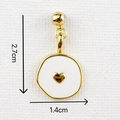 Detail view of heart pendant with white enamel and gold trim, size 2.7cm by 1.4cm - White Heart Enamel Pendant