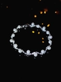 Elegant silver-tone bracelet featuring wavy metal links and white pearls in variant finish - Silver Pearl Style