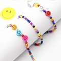 Colorful beaded eyewear chain with happy smiley face charms and vibrant dopamine colors - Smiley Face Dark
