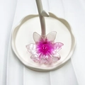 Pink gradient floral hair claw clip with glitter finish on a white jewelry plate - Pink (Pearlescent Sun Flower)