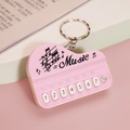 Pink mini piano keychain toy with 8 functional musical buttons and metal keyring - Bag Packaging / Macaron Pink