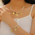 Bohemian beach jewelry set with colorful beads, gold starfish and seashell pendants - Bracelet + Necklace