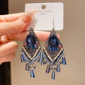 Macro detail of vintage silver needle earrings with blue crystal water drop tassels - Silver Blue Rhombus Palace (34#)