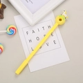 Yellow gel pen featuring a cute donut and unicorn topper in a creative stationery setting - Yellow Running Moon Unicorn