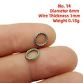 Detailed macro of 8mm twisted rope jump ring for DIY jewelry making and bead work - 14# (8x1mm)