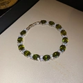 Bracelet élégant en argent avec pierres ovales vert émeraude et accents étincelants - Bracelet à Fermoir en Zircone Vert Foncé Ovale (14)