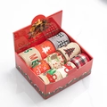 Close-up of assorted Christmas burlap ribbons with reindeer and truck patterns in a red gift box - Custom Made