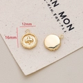 Detailed view of a 12mm gold clover pendant showing front relief and smooth back surface - 2# Clover