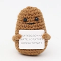 Brown knitted potato toy with Haters Gonna Hate text sign for emotional support - Potato H Card