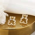 Elegant gold bear stud earrings featuring white pearls and clear cubic zirconia stones - E1660 Gold Pearl Hollow Bear
