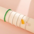 Minimalist 6-piece beaded bracelet set with green gems and bear flower pendants - White Green Beaded Set Style (0609)