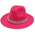 Close-up of bright pink fedora hat with a silver chain and colorful rhinestones - Rose Red