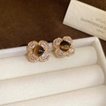 Detailed view of flower earrings with brown tiger eye stone and white zircon petals - 32# Four-Leaf Clover Tiger Eye Zircon Studs (925 Sterling Silver Earring Post)