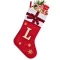 Detail of red velvet Christmas stocking with white knit cuff and gold glitter letter L - Red L
