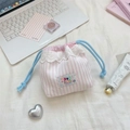 Detail of pink striped drawstring bag with white lace heart edge and blue cotton cord - Pink Stripes