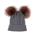 Close-up of grey cable knit baby hat with two large fluffy brown pom-poms on top - Adult Grey