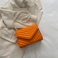 Orange PU leather crossbody bag with V-quilted texture and elegant pearl shoulder strap - Orange