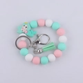 Bracciale portachiavi a sirena in silicone con perline pastello e nappa rosa - Verde
