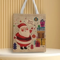 Detail of Santa Claus and Christmas tree print on a beige canvas tote bag surface - Style 42