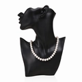 Classic creamy white pearl necklace displayed on a black matte portrait neck mannequin - Black