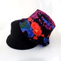 Detail view of black and colorful abstract print reversible bucket hats for street fashion - Multicolor Abstract Pattern