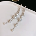 French vintage pearl tassel earrings with silver chains and rhinestones on a white plate - Rhinestone Pearl Tassel (68#)