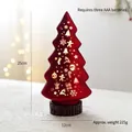 Red Christmas tree night light with golden snowflake and reindeer patterns on a wooden base - Red Christmas Tree