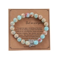 Handmade turquoise bead bracelet with silver butterfly pendant on kraft card - Blue Pink Spotted Butterfly Shoushan Stone Bracelet