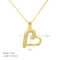 Macro shot of gold-plated heart pendant with zircons showing 21mm x 22mm dimensions - Asymmetrical Curved Heart Style (DN240705-F)