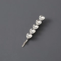 Sparkling silver metal hair clip featuring five heart-shaped crystals in a neat row - White Rhinestone / Silver Heart