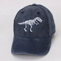 Detail of white dinosaur skeleton embroidery on a dark blue washed cotton baseball cap - 48-53cm (2-8 Years) / Blue