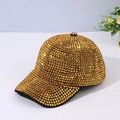 Close-up detail of luxury gold baseball cap with sparkling rhinestones and metal studs - Adjustable / Gold