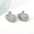 Macro shot of teardrop earrings with silver finish and pave-set white cubic zirconia stones - Silver Teardrop