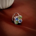 Macro shot of silver ring with green and blue marquise stones in floral design - Adjustable Open / Blue Green Zirconia Flower Ring