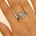 Hollow flower mandala stainless steel ring in silver finish worn by female model - Steel (9587)