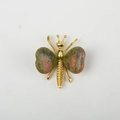Butterfly wing ornament with natural green and red crystals in a gold metal frame - Unakite