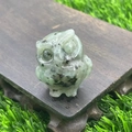Green natural stone owl figurine 3.5cm with black spots on a wooden base - Kiwi