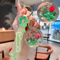 Green rose flower liquid quicksand keychain with Sakura wrist strap and gold ring - Lanyard Style / Green
