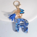 Royal blue resin letter R keychain with gold foil flakes, blue tassel and butterfly - Letter R