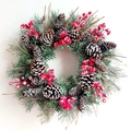 Artificial Christmas wreath with pine cones and red berries on a white background - 50cm Wreath