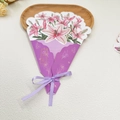Detail of 3D Mother's Day card with pink lilies and purple ribbon tied in a bow - Lily